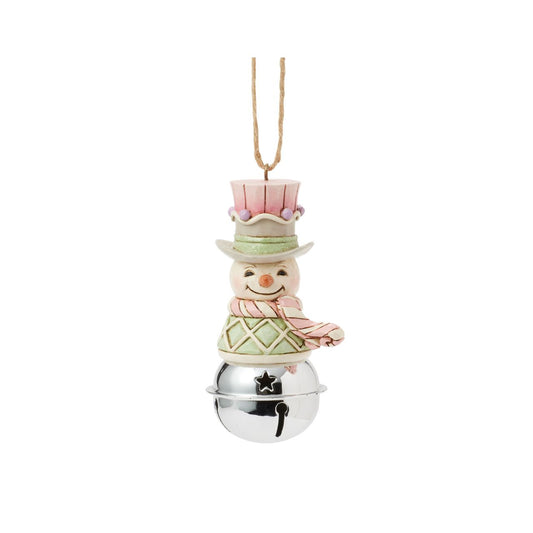 This delightful Jim Shore Heartwood Sweets jingle bell ornament features a charming miniature bust of a snowman, smiling in pastel decor, his vest is decorated with festive gumdrops. Ring in the season with Jim Shore.