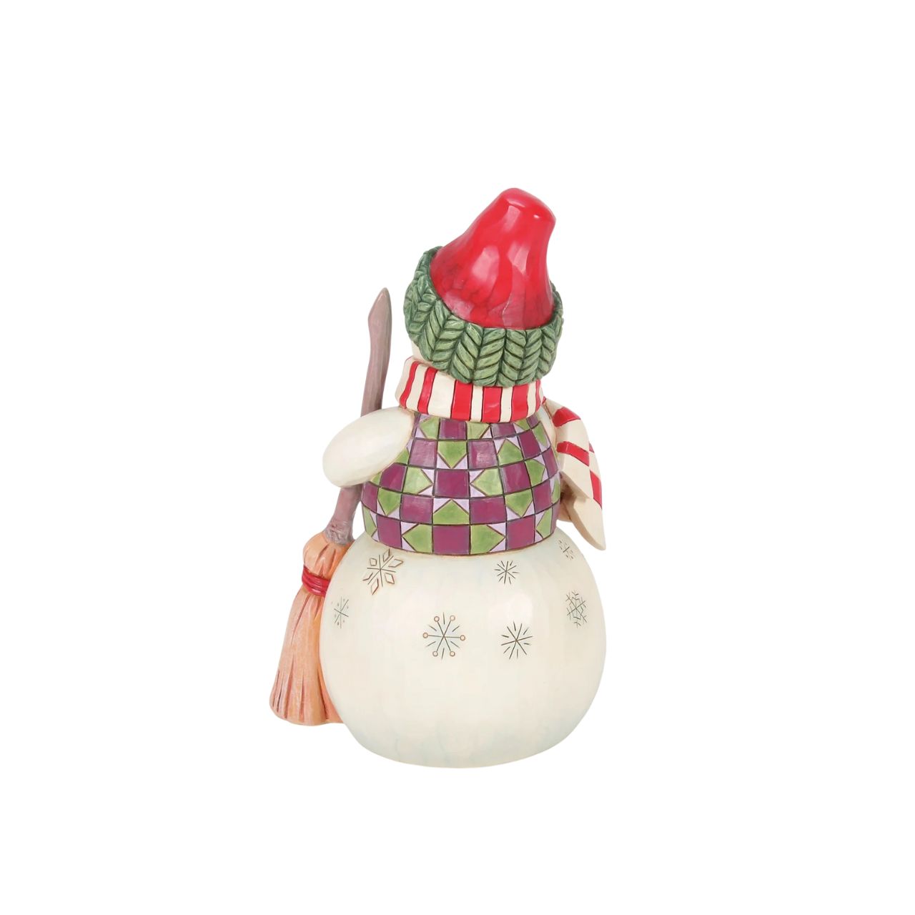 This Jim Shore snowman is dressed in a patterned tunic and holds a broom, and is accompanied by a precious pup peeking out with an excitable spirit. Together, they embody the joy of the season, spreading smiles and warmth through the snowy landscape.