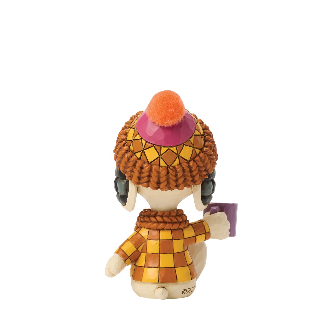 Snoopy bundles up in cosy shades of orange in this charming Jim Shore design. Dressed for fall with a pompom hat and a mug in hand, he brings warmth and whimsy to autumn days with classic folk-art touches.
