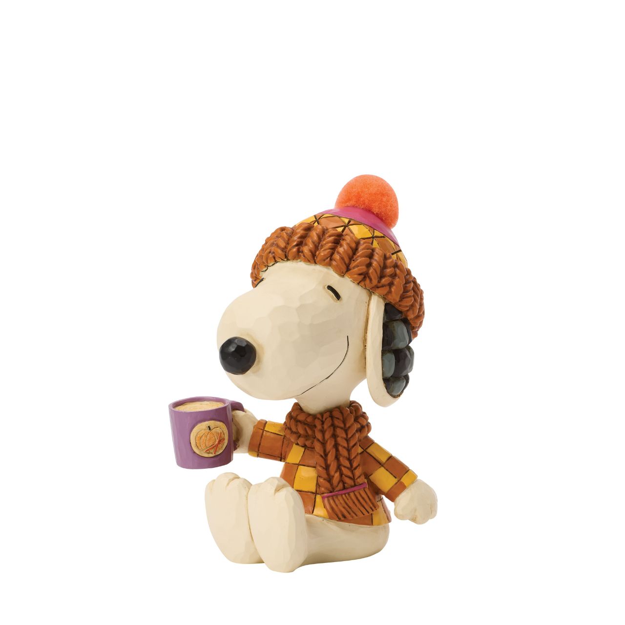 Snoopy bundles up in cosy shades of orange in this charming Jim Shore design. Dressed for fall with a pompom hat and a mug in hand, he brings warmth and whimsy to autumn days with classic folk-art touches.
