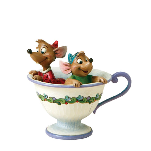 Disney Cinderella Tea For Two - Jaq & Gus Figurine by Jim Shore  Jac and Gus perch themselves inside Lady Tremaine's tea cup as they scheme to get the key and rescue Cinderella. Mice have wire tails. Designed by award-winning sculptor Jim Shore for Disney Traditions.