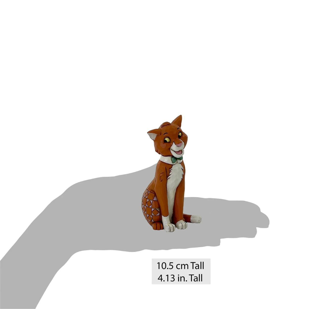 Celebrate the 55th anniversary of The Aristocats in 2025 with this charming rendition of Thomas O'Malley, the alley cat, who has found his new home with Duchess and the kittens. With a stylish bow collar and patchwork details, he poses with love in his eyes.