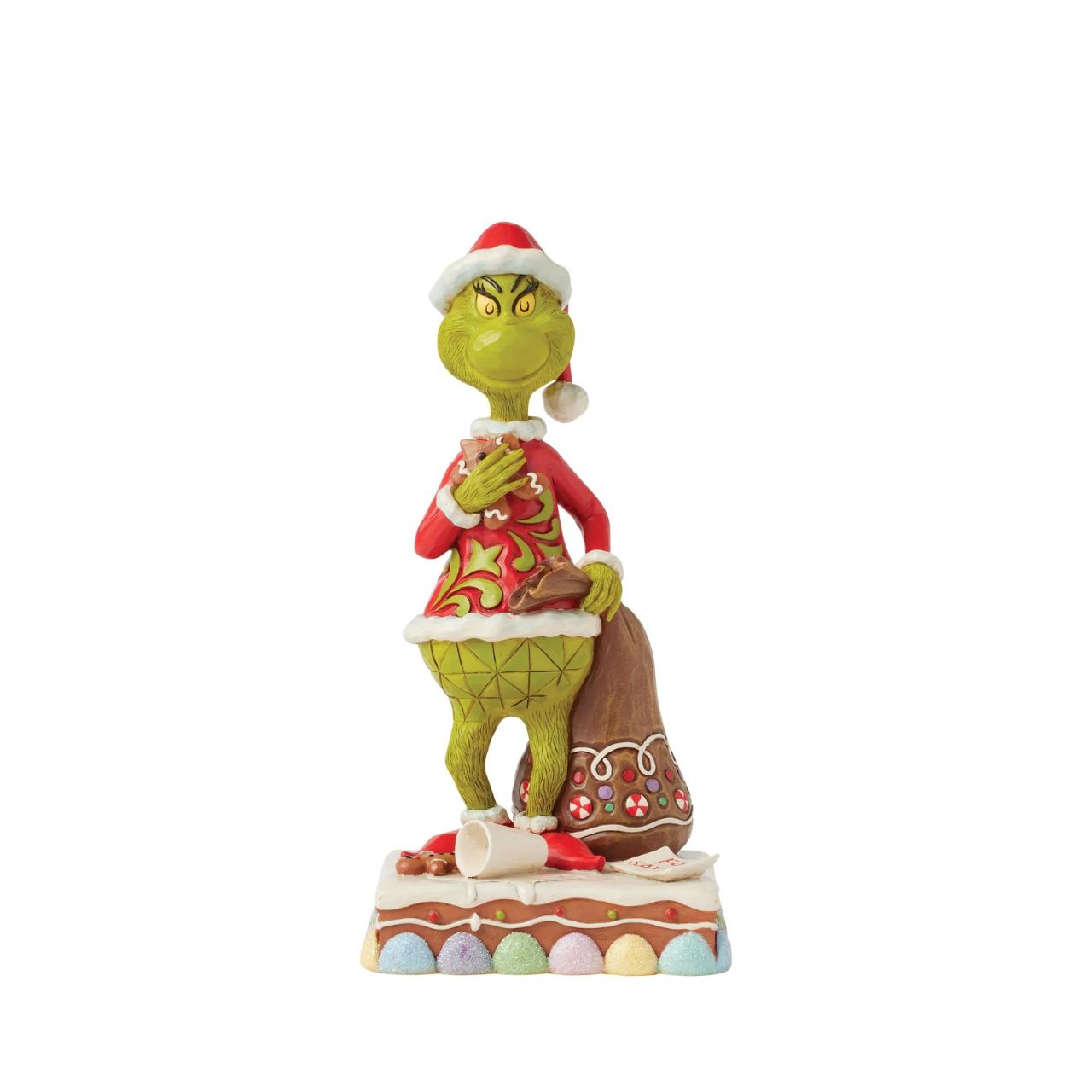 Dressed as Santa with a sack to steal presents, The Grinch gleefully munches on cookies and spills Santa's milk. Adorned with Jim Shore's signature rosemaling and intricate details, this piece brings The Grinch's playfully sinister spirit to life.