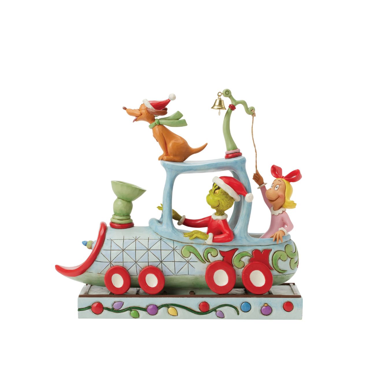 All aboard the Grinchy Express. In this charming Jim Shore creation, The Grinch steers a train engine adorned with delightful floral rosemaling. Max rides on top while Cindy Lou rings a real bell, bringing Seuss's classic tale to life with sound.