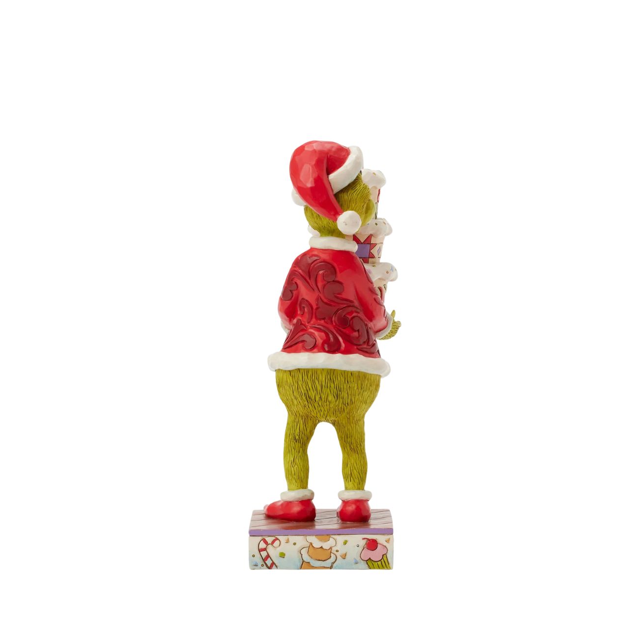 Disguised as Santa, The Grinch beams with trickery as he steals a towering cake. Adorned with Jim Shore's iconic rosemaling, patchwork patterns, and charming floral details, this piece captures the mischief of Christmas in true Grinch fashion.