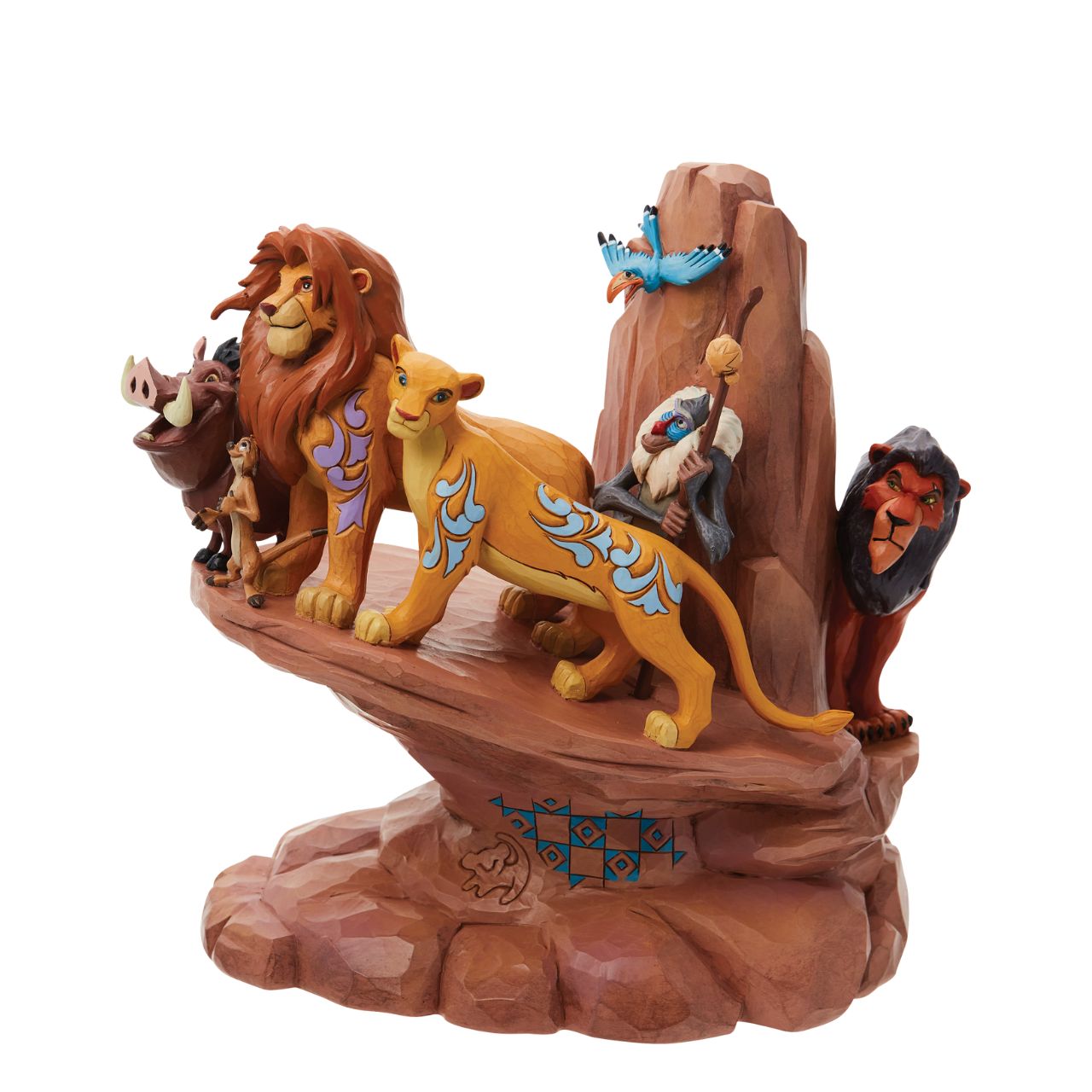 This incredible creation by Jim Shore celebrates the 30th anniversary of Disney's beloved 1994 film, The Lion King. With patchwork patterning and Rafiki's Simba drawing, Pride Rock looks stately as the main characters stand upon the stage.