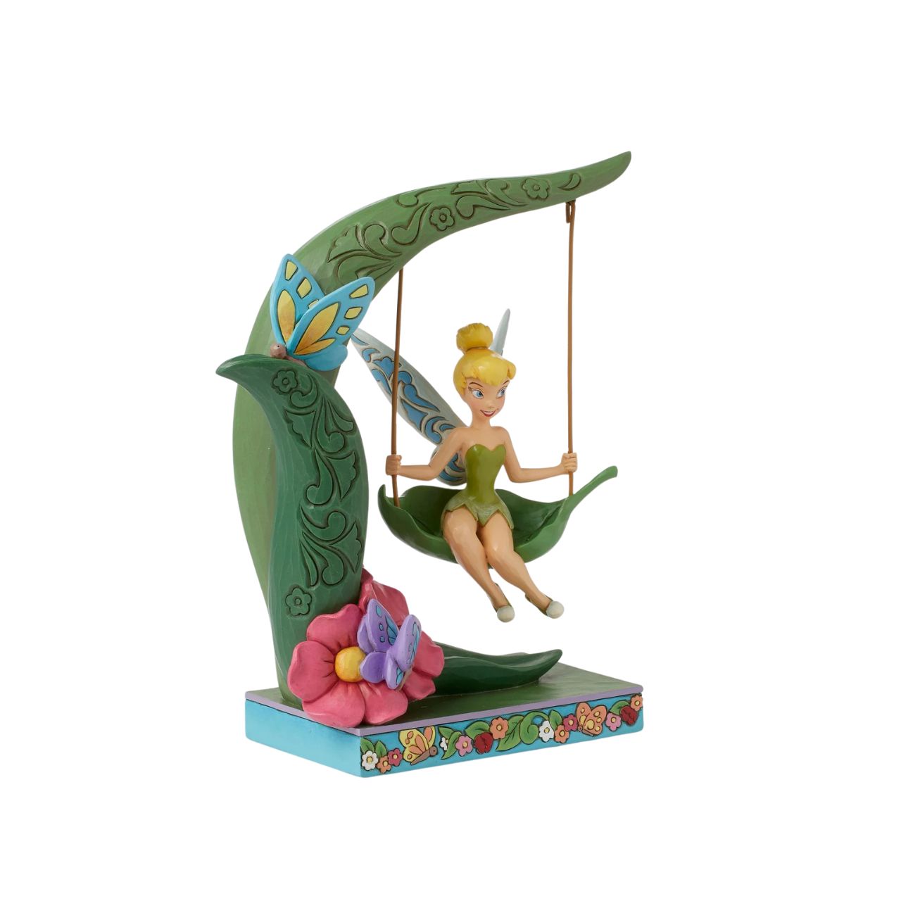This magical piece features Disney's Tinker Bell playing on a flowery spring. The iconic pixie from Peter Pan is enjoying herself on this sweet spring themed figurine as part of the Disney Traditions collection by Jim Shore.
