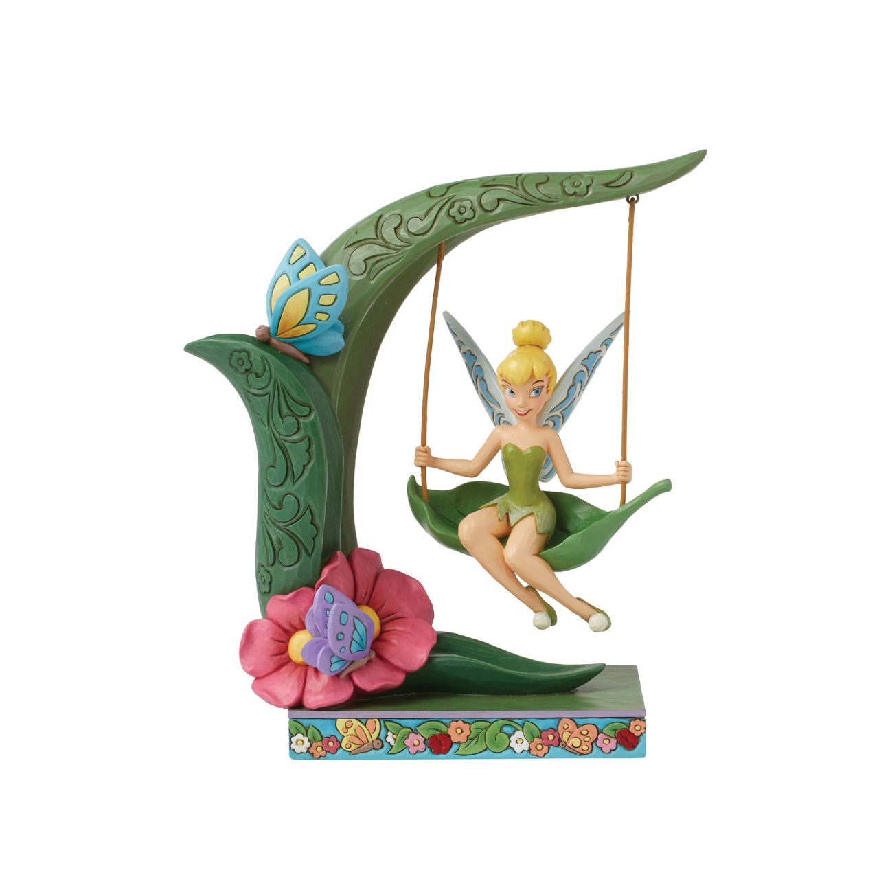 This magical piece features Disney's Tinker Bell playing on a flowery spring. The iconic pixie from Peter Pan is enjoying herself on this sweet spring themed figurine as part of the Disney Traditions collection by Jim Shore.