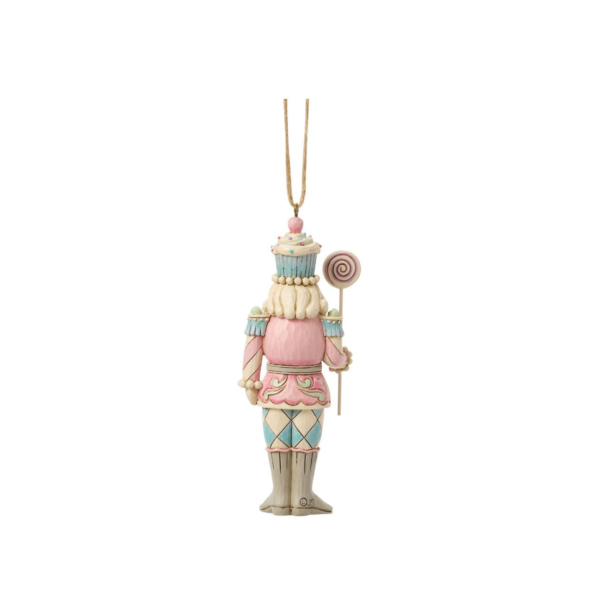 A playful twist on tradition, this toy soldier holds a bright candy lollipop and wears a cupcake helmet. Jim Shore's artistry transforms the disciplined officer into a whimsical holiday friend. Perfect for sweetening any Christmas display.