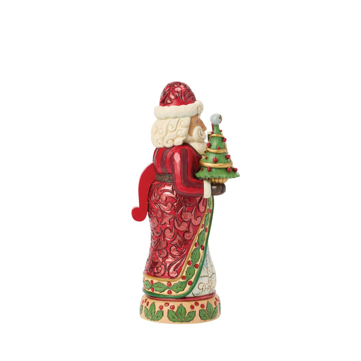 Dressed in classic red and green, this Santa Nutcracker glows with tradition. His cloak reveals a sparkling winter scene. Jim Shore's artistry shines through every carved swirl and hand-painted accent, making it a keepsake for Christmases to come.