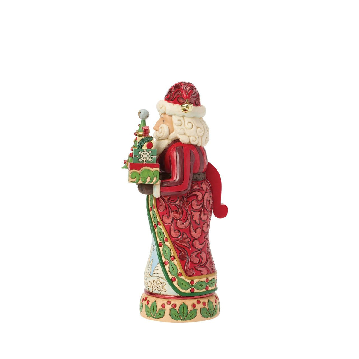 Dressed in classic red and green, this Santa Nutcracker glows with tradition. His cloak reveals a sparkling winter scene. Jim Shore's artistry shines through every carved swirl and hand-painted accent, making it a keepsake for Christmases to come.