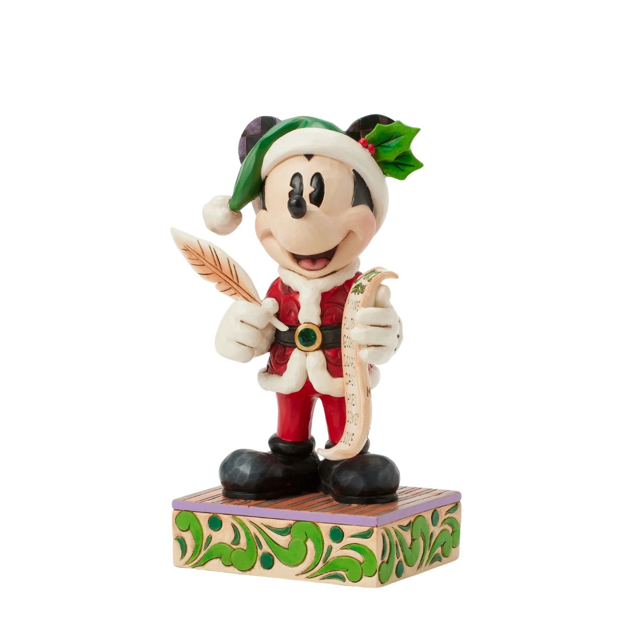 In this enchanting Jim Shore Christmas scene, Mickey Mouse dons a striking red rosemaling suit accented with a green jewelled belt and a Santa hat trimmed with holly. He holds a quill and a list of Naughty and Nice Disney characters with a smile.