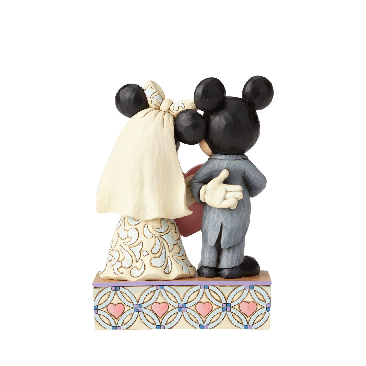 Disney Mickey Mouse and Minnie Mouse Figurine Two Souls, One Heart  This beautifully detailed figurine is a gorgeous depiction of Mickey as a doting groom with quilted accents on his suit and Minnie as a blushing bride in a gown with rosemaling details.