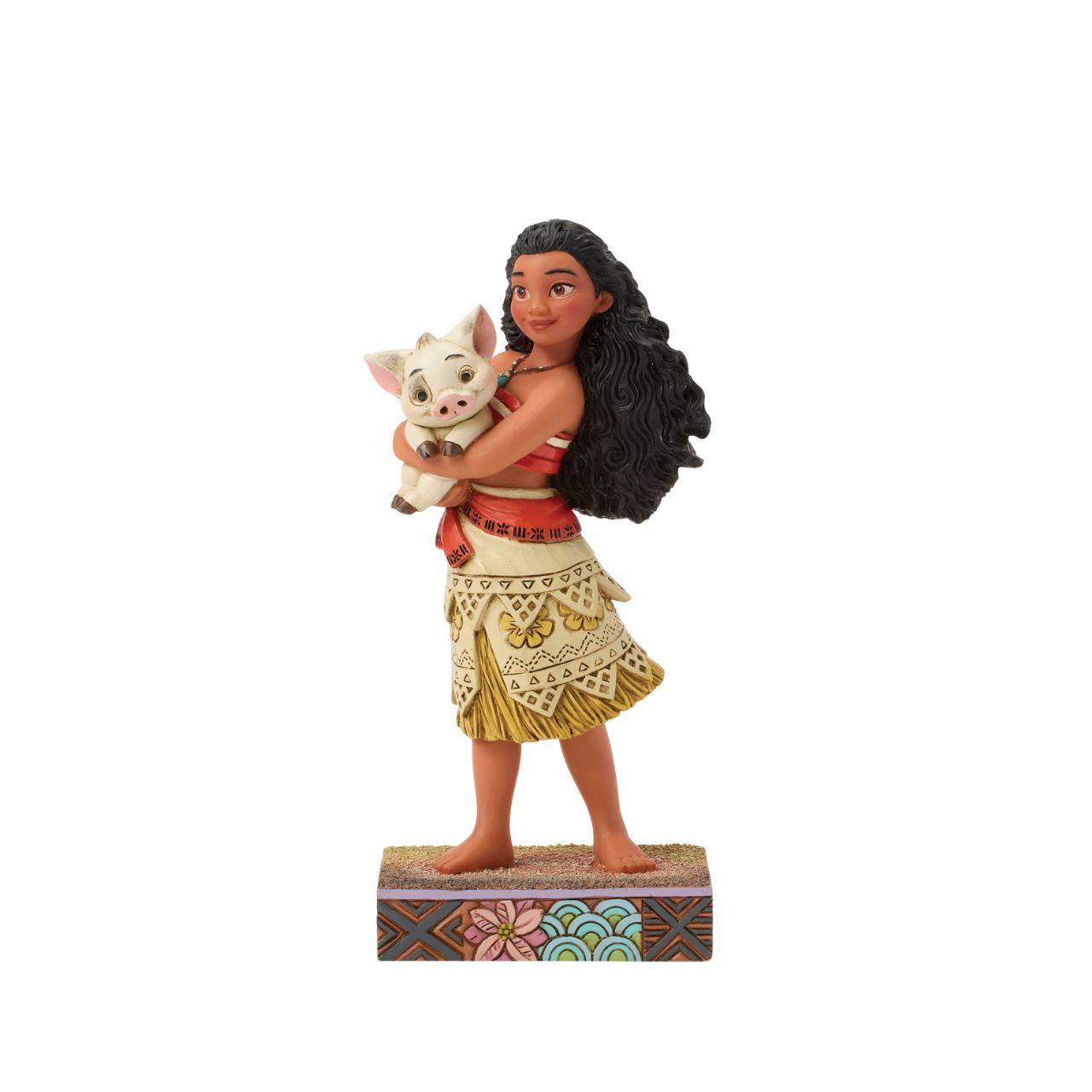 This intricate Jim Shore scene depicts Moana holding her best friend, Pua the pig, in a tight embrace. They smile together on a sand stage, with textured patterns and vibrant colour. Jim Shore's warm craftsmanship brings the scene to life.