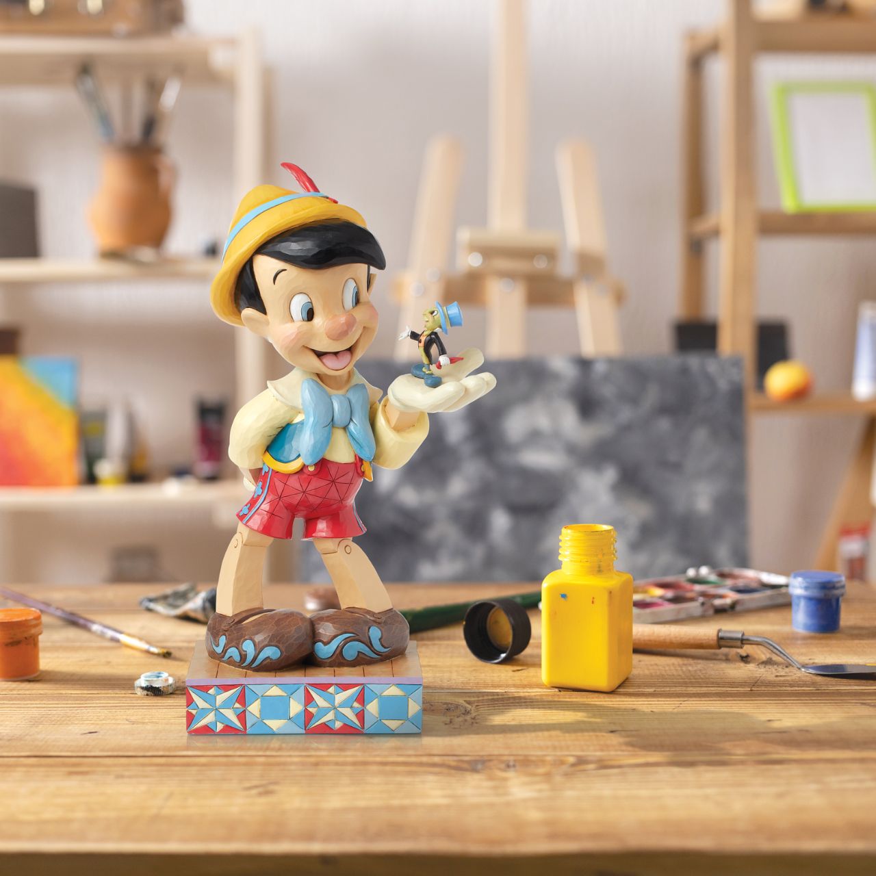 Disney's Pinocchio is the size of a real boy with this figurine. Hand carved and painted, this piece comes from the Disney Traditions collection by Jim Shore. This impressive piece comes packaged in a fully branded gift box.