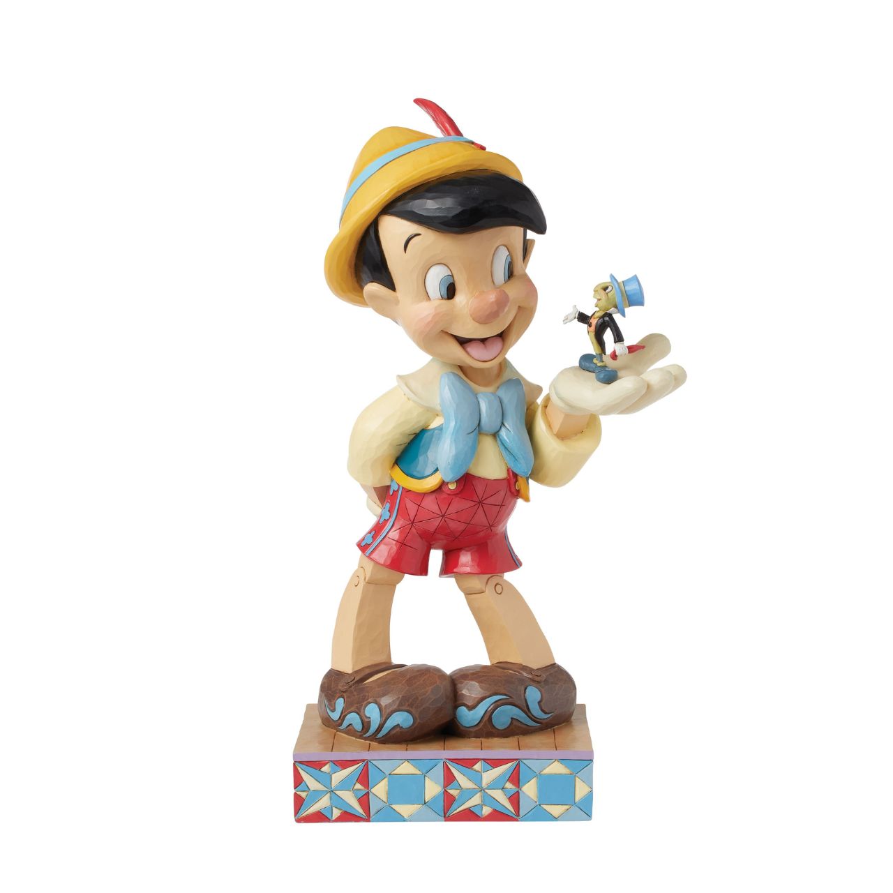 Disney's Pinocchio is the size of a real boy with this figurine. Hand carved and painted, this piece comes from the Disney Traditions collection by Jim Shore. This impressive piece comes packaged in a fully branded gift box.
