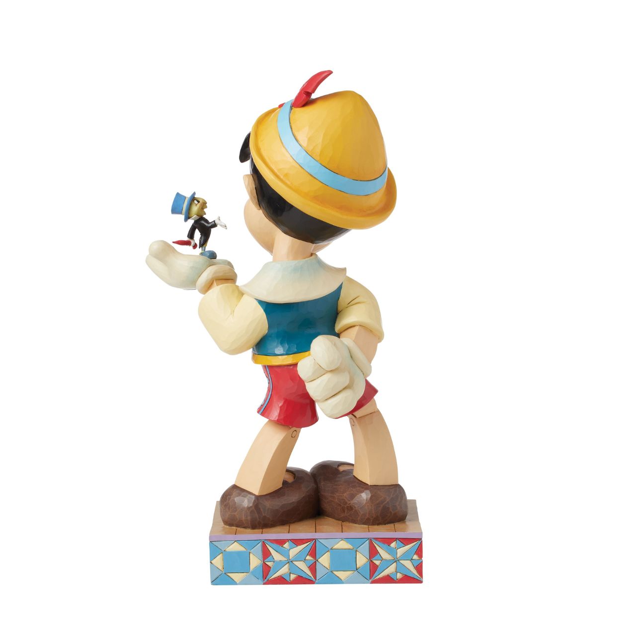 Disney's Pinocchio is the size of a real boy with this figurine. Hand carved and painted, this piece comes from the Disney Traditions collection by Jim Shore. This impressive piece comes packaged in a fully branded gift box.