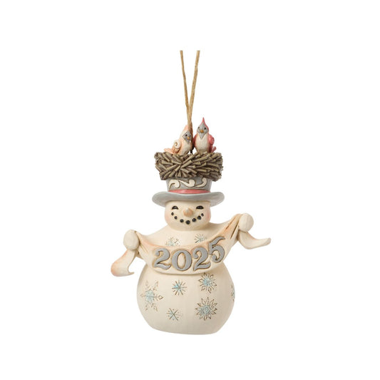 This endearing Jim Shore ornament features a snowman adorned with snowflakes, wearing a bird's nest as a hat with two cardinals. Holding a festive banner that reads "2025," this piece drives home the promise of new beginnings for the year ahead.