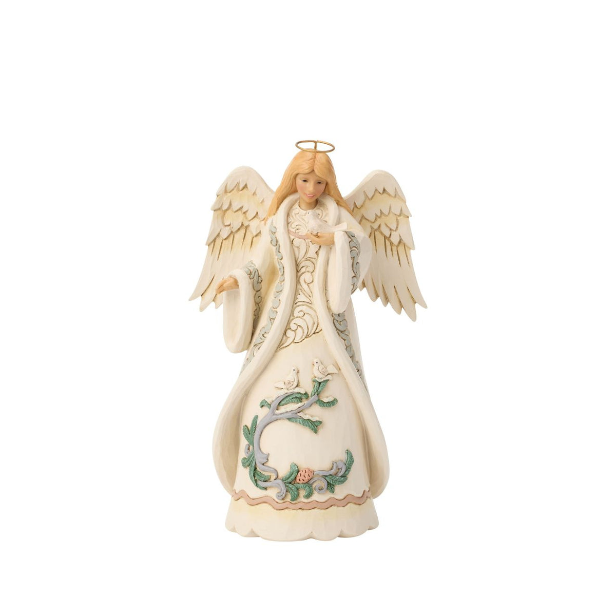 The Heartwood Creek Woodland Angel with Dove figurine is a beautiful testament to Jim Shore's artistry. This enchanting piece captures the essence of peace and goodwill, featuring an angel adorned with woodland patterns, gently holding a dove, a symbol of hope and tranquillity.