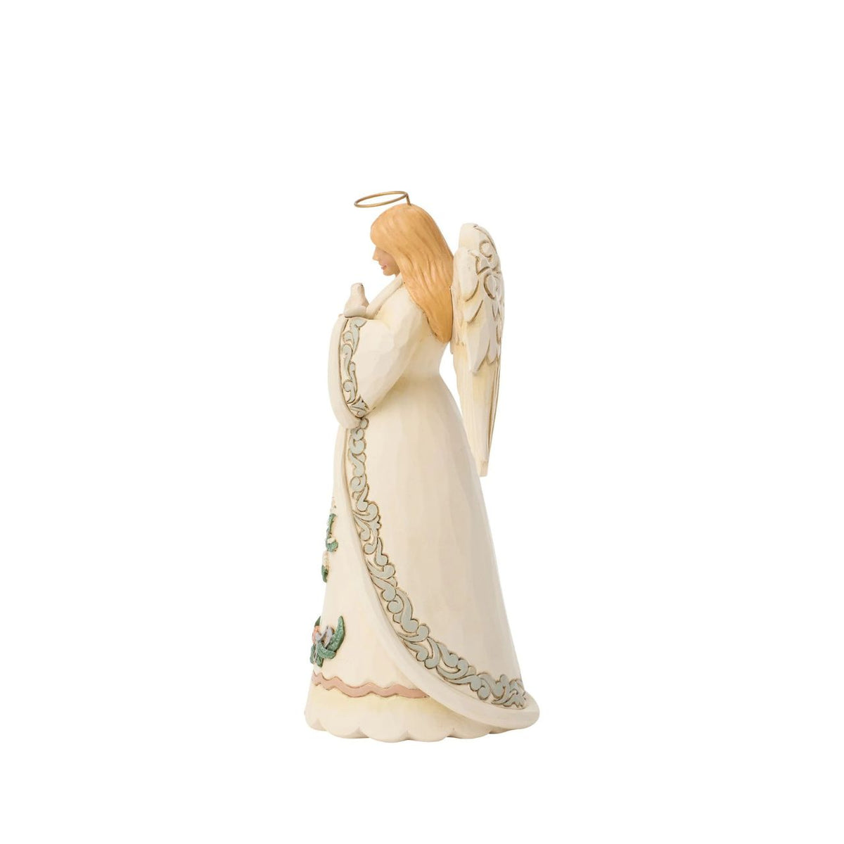 The Heartwood Creek Woodland Angel with Dove figurine is a beautiful testament to Jim Shore's artistry. This enchanting piece captures the essence of peace and goodwill, featuring an angel adorned with woodland patterns, gently holding a dove, a symbol of hope and tranquillity.
