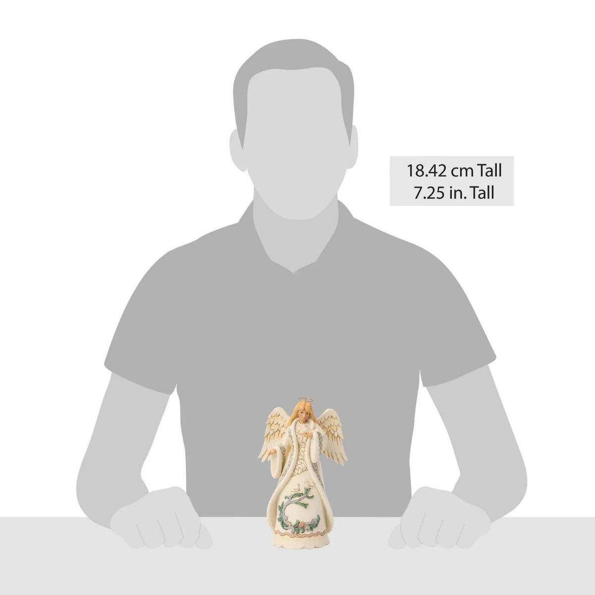 The Heartwood Creek Woodland Angel with Dove figurine is a beautiful testament to Jim Shore's artistry. This enchanting piece captures the essence of peace and goodwill, featuring an angel adorned with woodland patterns, gently holding a dove, a symbol of hope and tranquillity.