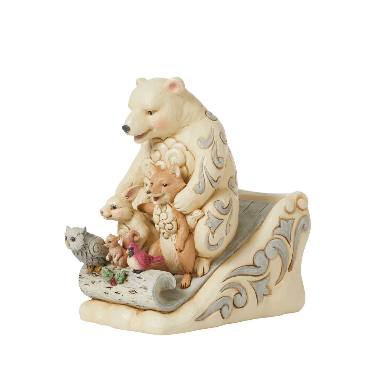 From the White Woodland collection as part of Heartwood Creek by Jim Shore, this group of animal friends having fun in the snow is the perfect addition to any Christmas display.