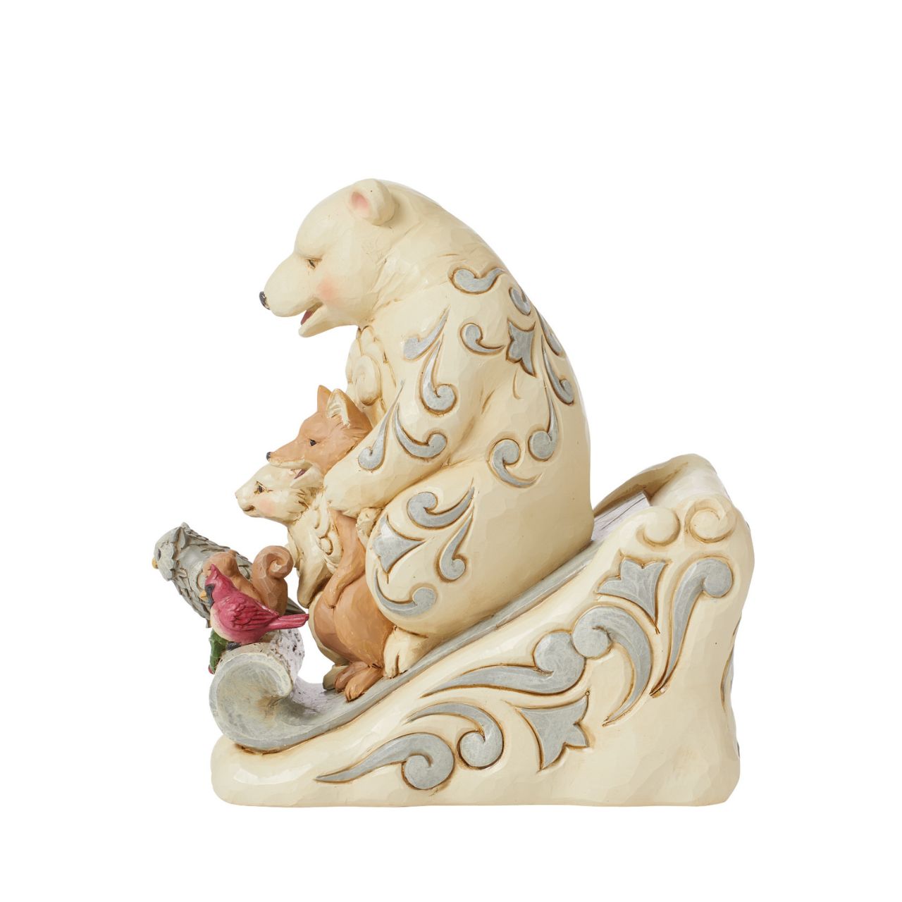 From the White Woodland collection as part of Heartwood Creek by Jim Shore, this group of animal friends having fun in the snow is the perfect addition to any Christmas display.