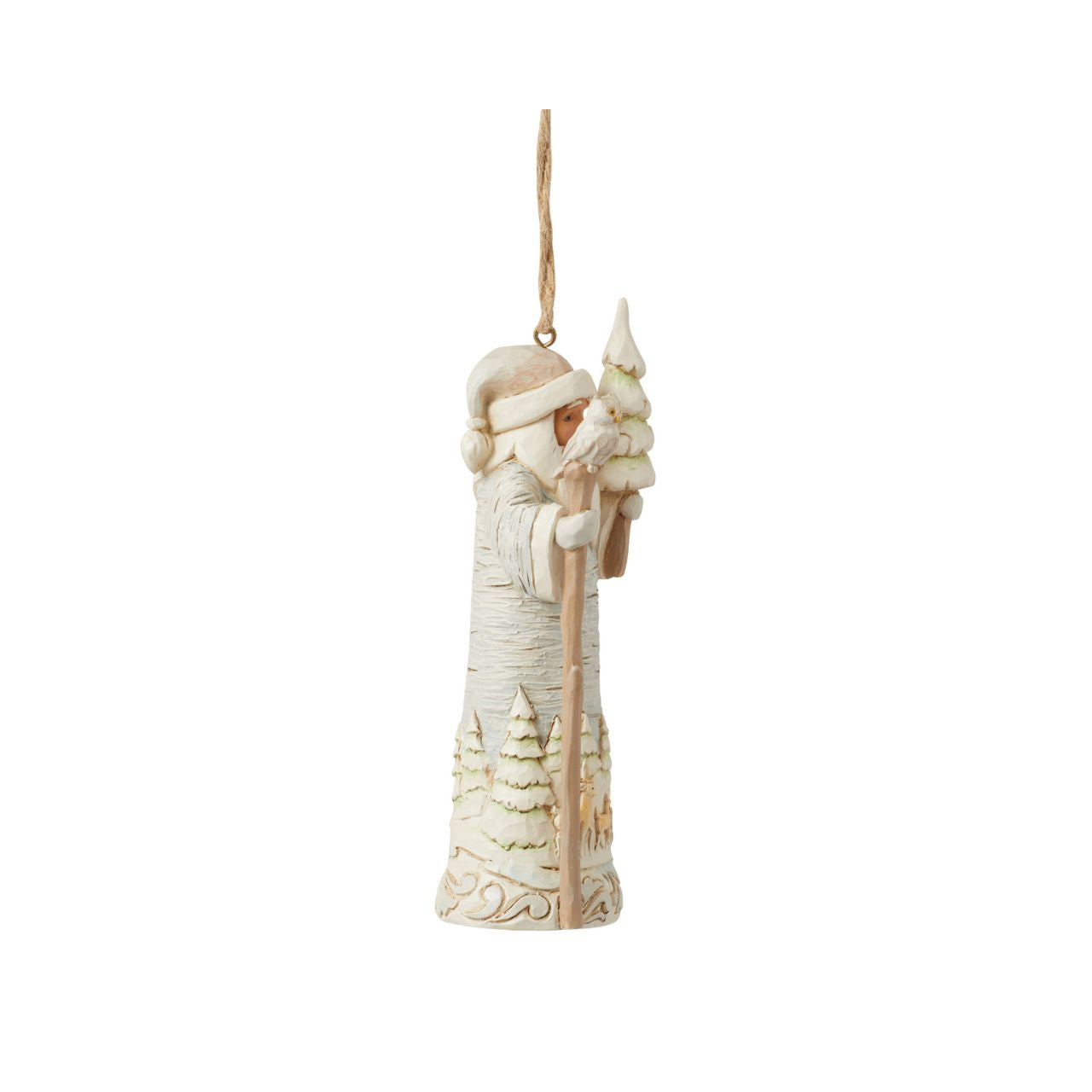 From the White Woodland collection as part of Heartwood Creek by Jim Shore, this Santa hanging ornament is created to look like he is carved from silver birch wood, a fun and creative way to bring the outside in this Christmas.