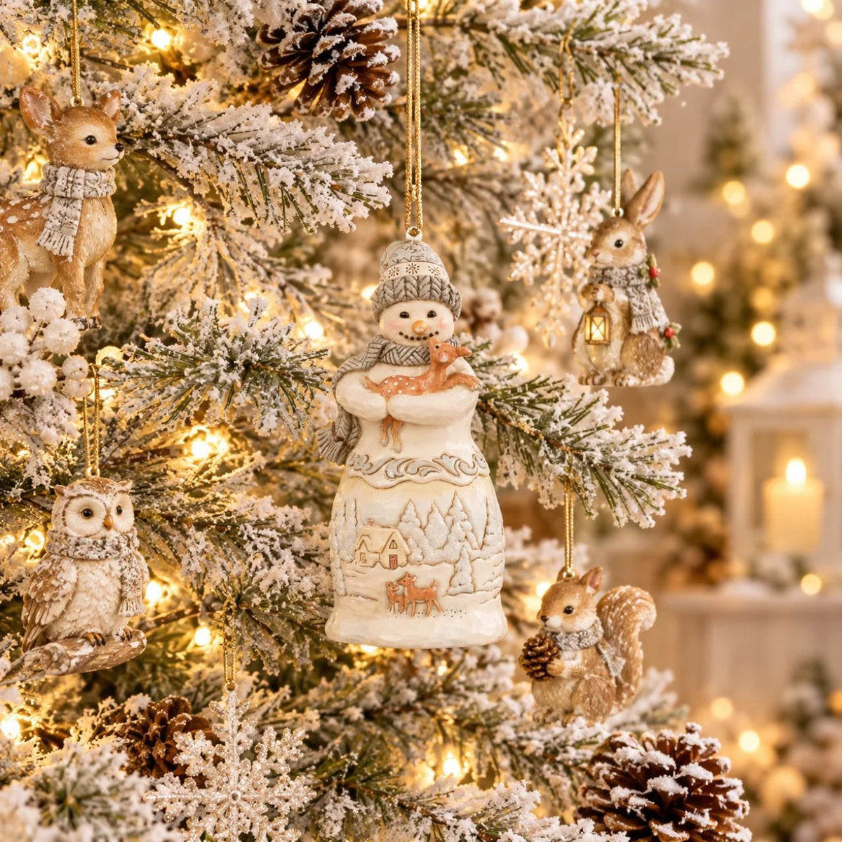 Embrace the enchantment of winter with the Woodland Snowman figurine from the esteemed Heartwood Creek collection by Jim Shore. This charming piece showcases a beautifully detailed snowman, lovingly crafted with the signature folk-art style that Jim Shore is renowned for.