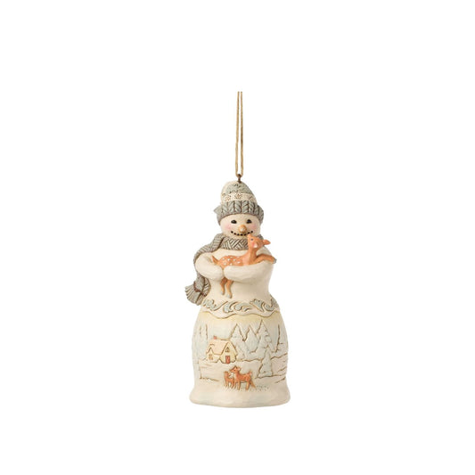 Embrace the enchantment of winter with the Woodland Snowman figurine from the esteemed Heartwood Creek collection by Jim Shore. This charming piece showcases a beautifully detailed snowman, lovingly crafted with the signature folk-art style that Jim Shore is renowned for.