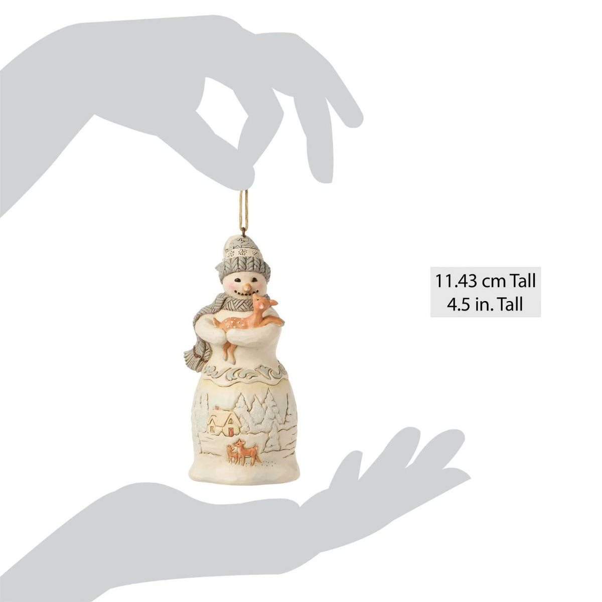 Embrace the enchantment of winter with the Woodland Snowman figurine from the esteemed Heartwood Creek collection by Jim Shore. This charming piece showcases a beautifully detailed snowman, lovingly crafted with the signature folk-art style that Jim Shore is renowned for.