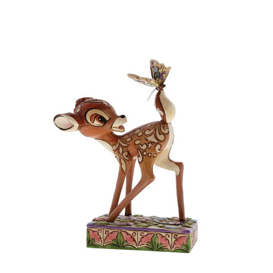 Disney Traditions Wonder of Spring Bambi Figurine  This wonderful figurine from Disney Traditions features Bambi and a butterfly playing together. A perfect addition to your collection, or a great gift for someone special. Designed by award-winning artist and sculptor, Jim Shore.