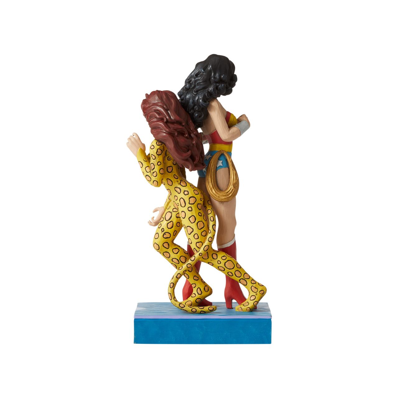 Jim Shore Wonder Woman and Cheetah Figurine  Jim Shore celebrates Wonder Woman and Cheetah back to back in his signature wood carved look and folk art styling. Sure to be a treasured gift across the generations. Unique variations should be expected as this product is hand painted.