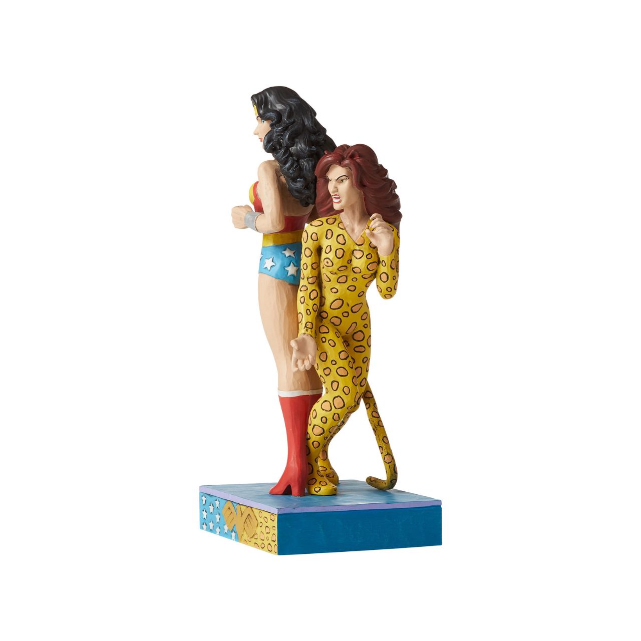 Jim Shore Wonder Woman and Cheetah Figurine  Jim Shore celebrates Wonder Woman and Cheetah back to back in his signature wood carved look and folk art styling. Sure to be a treasured gift across the generations. Unique variations should be expected as this product is hand painted.