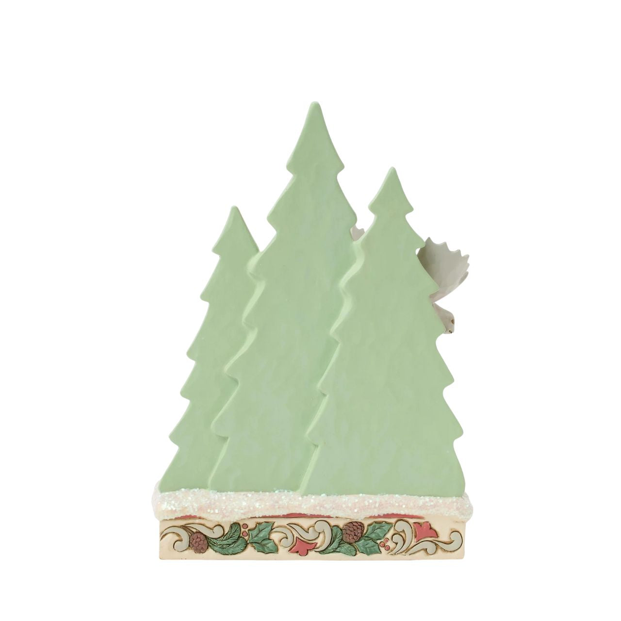 This captivating Jim Shore design features a majestic moose adorned with the artist's signature patchwork patterning on his hide, standing against a backdrop of uniquely patterned trees. With intricate details, it captures the peace of the forest.