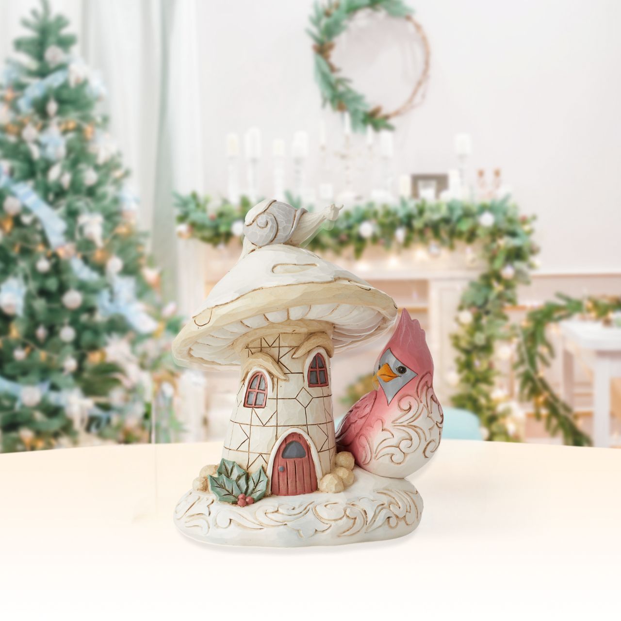 Woodland Mushroom House with Cardinal Figurine by Jim Shore  "Home For the Holidays" Designed in the iconic style of Jim Shore. This mushroom house is inhabited by woodland creatures ready to settle down in comfort for the festive season. Hand painted in high quality cast stone.