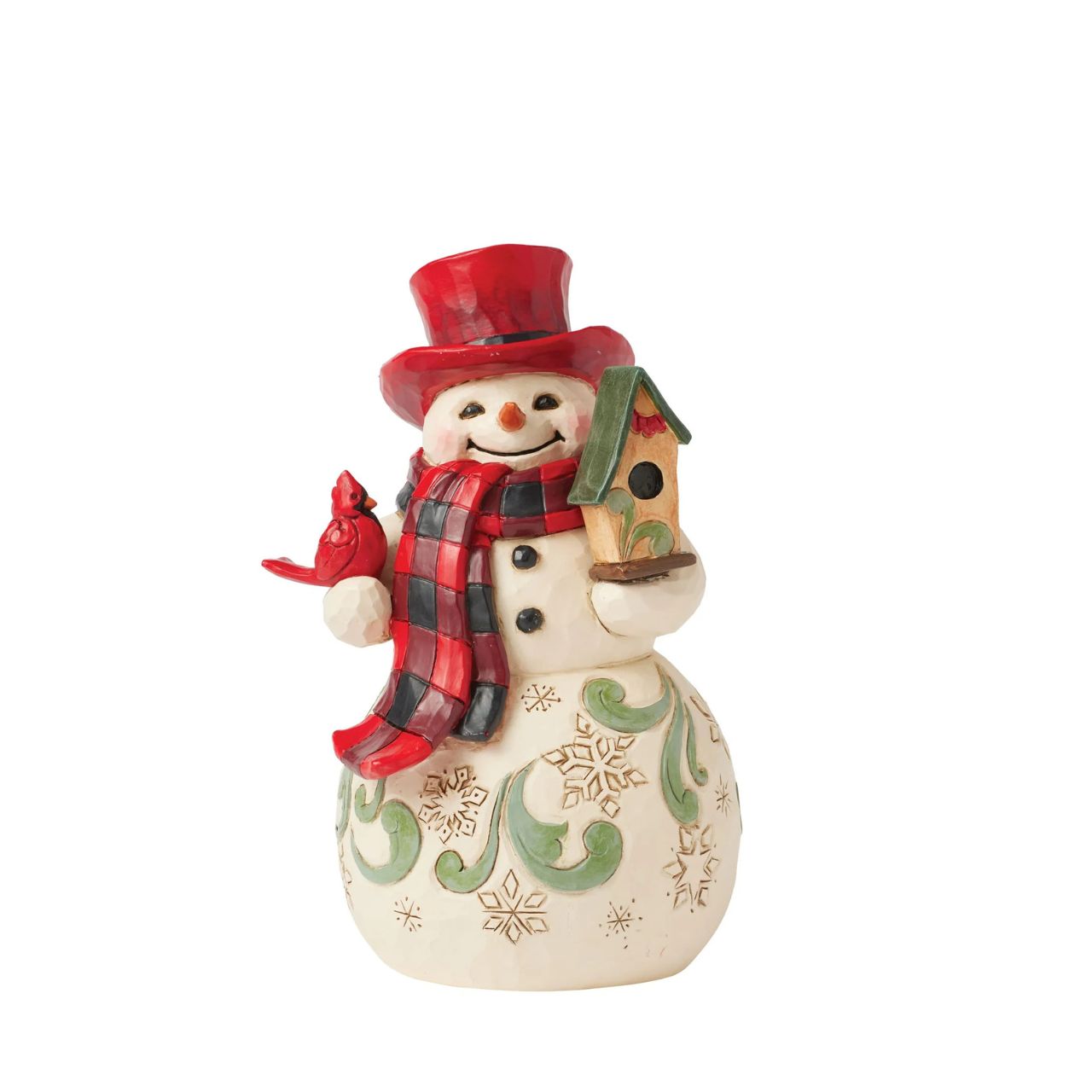 This whimsical Jim Shore Highland Glen snowman wears a cozy buffalo plaid scarf and a vibrant red top hat. Holding a charming birdhouse with a friendly cardinal perched beside him, his joyful smile radiates warmth and holiday spirit.