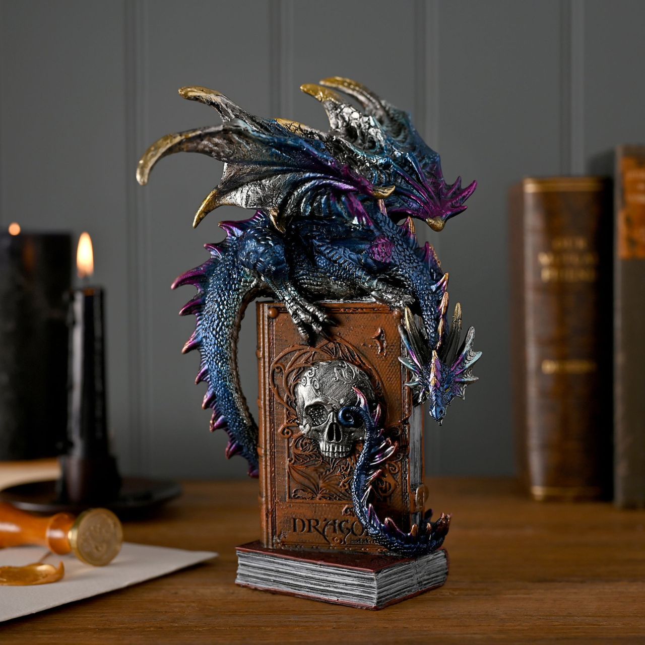 A Blue Peering Down Dragon Fantasy Figurine Ornament from the Mystic Legends Collection by Juliana Collection.