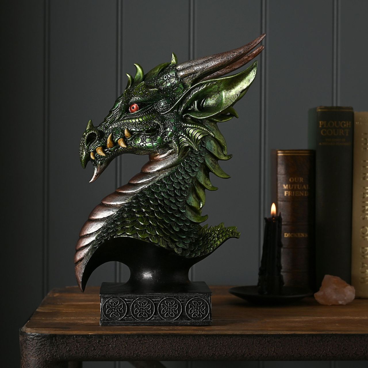 This majestic green and bronze coloured piece with a metallic effect finish, is made from high-quality resin allowing for intricate detailing. A brand for customers and avid collectors who are drawn to the mystical and gothic aesthetic.