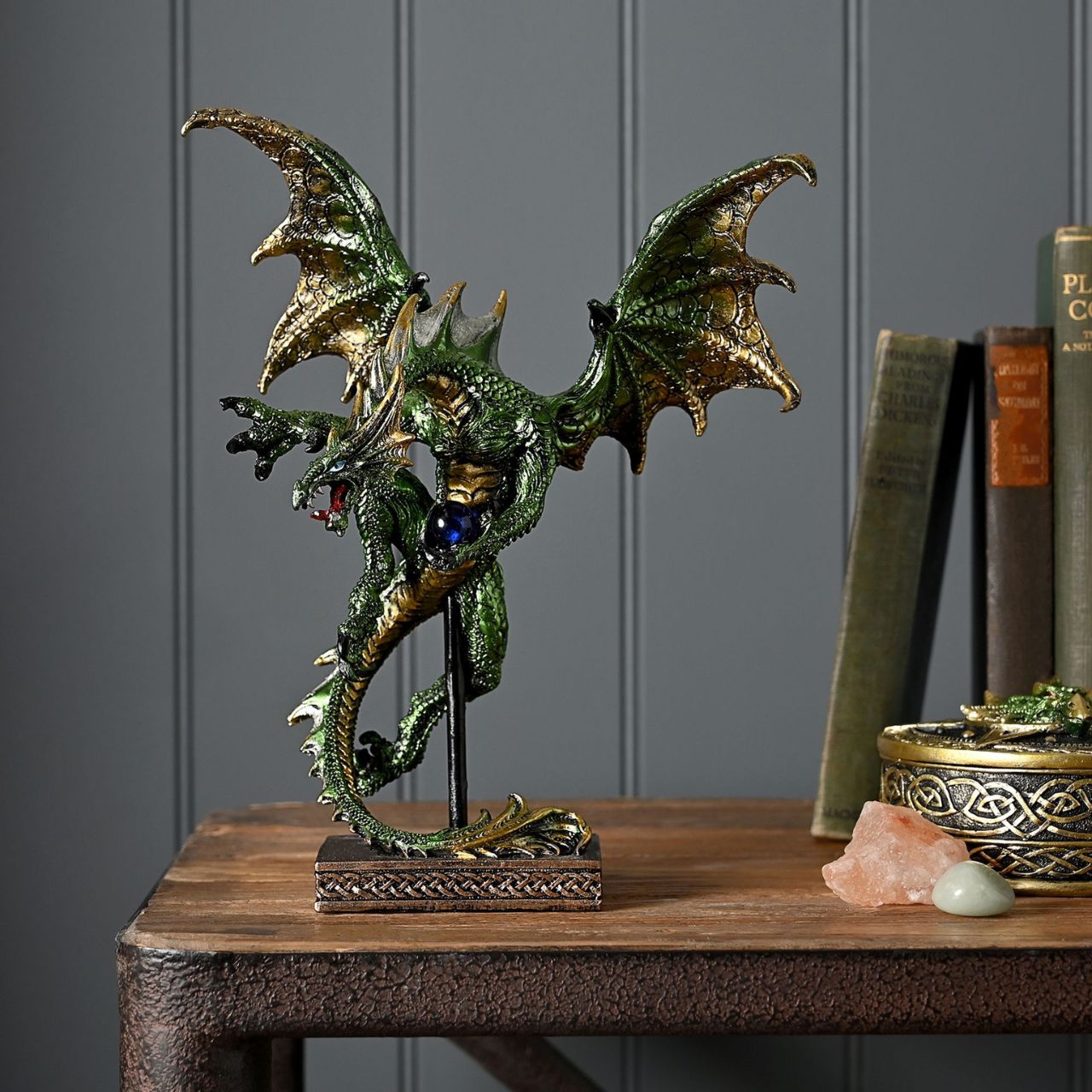 A Green Dragon in Mid-Flight Clutching a Ball, from the Mystic Legends Collection by Juliana Collection.