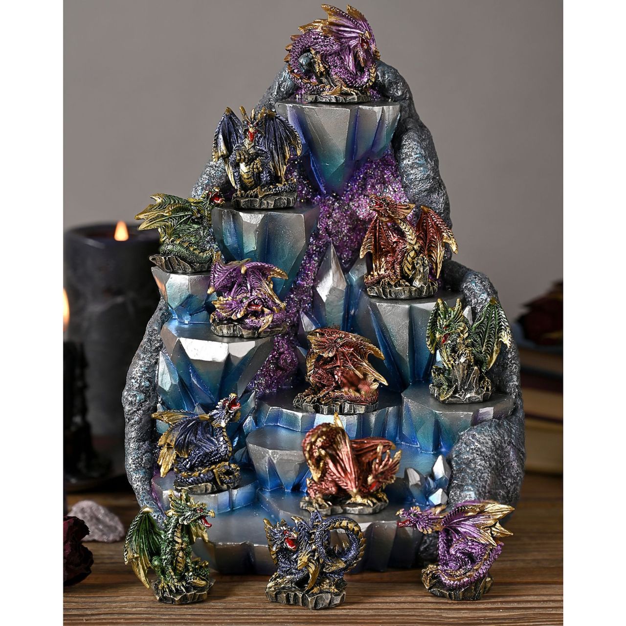These figurines stand out due to their striking designs and powerful colours, which have a metallic effect finish. They are made from high-quality resin which allows for intricate detailing. A brand for customers and avid collectors who are drawn to the mystical and gothic aesthetic.