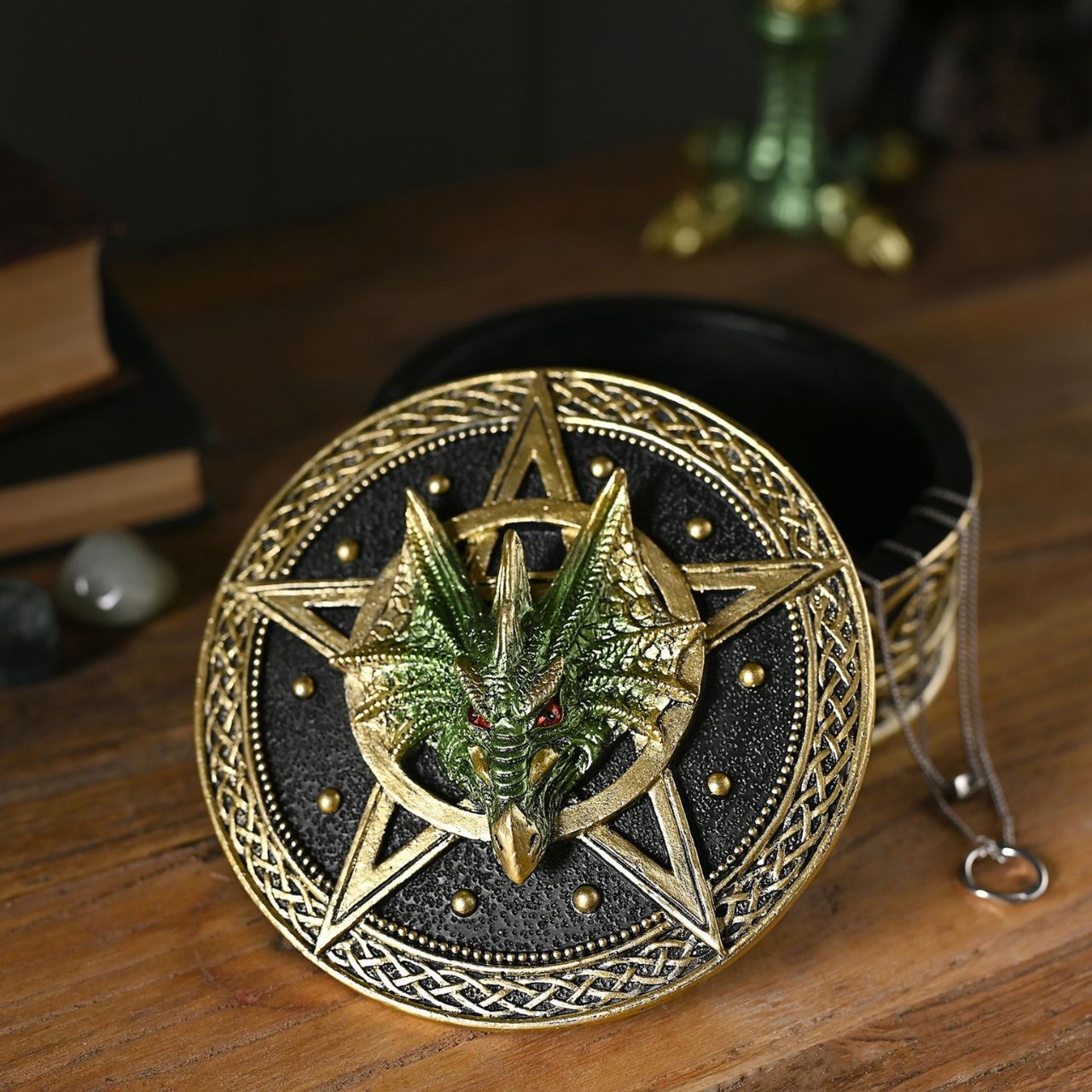 This gold, black, and green coloured piece with a metallic effect finish, is made from high-quality resin allowing for intricate detailing. A brand for customers and avid collectors who are drawn to the mystical and gothic aesthetic.