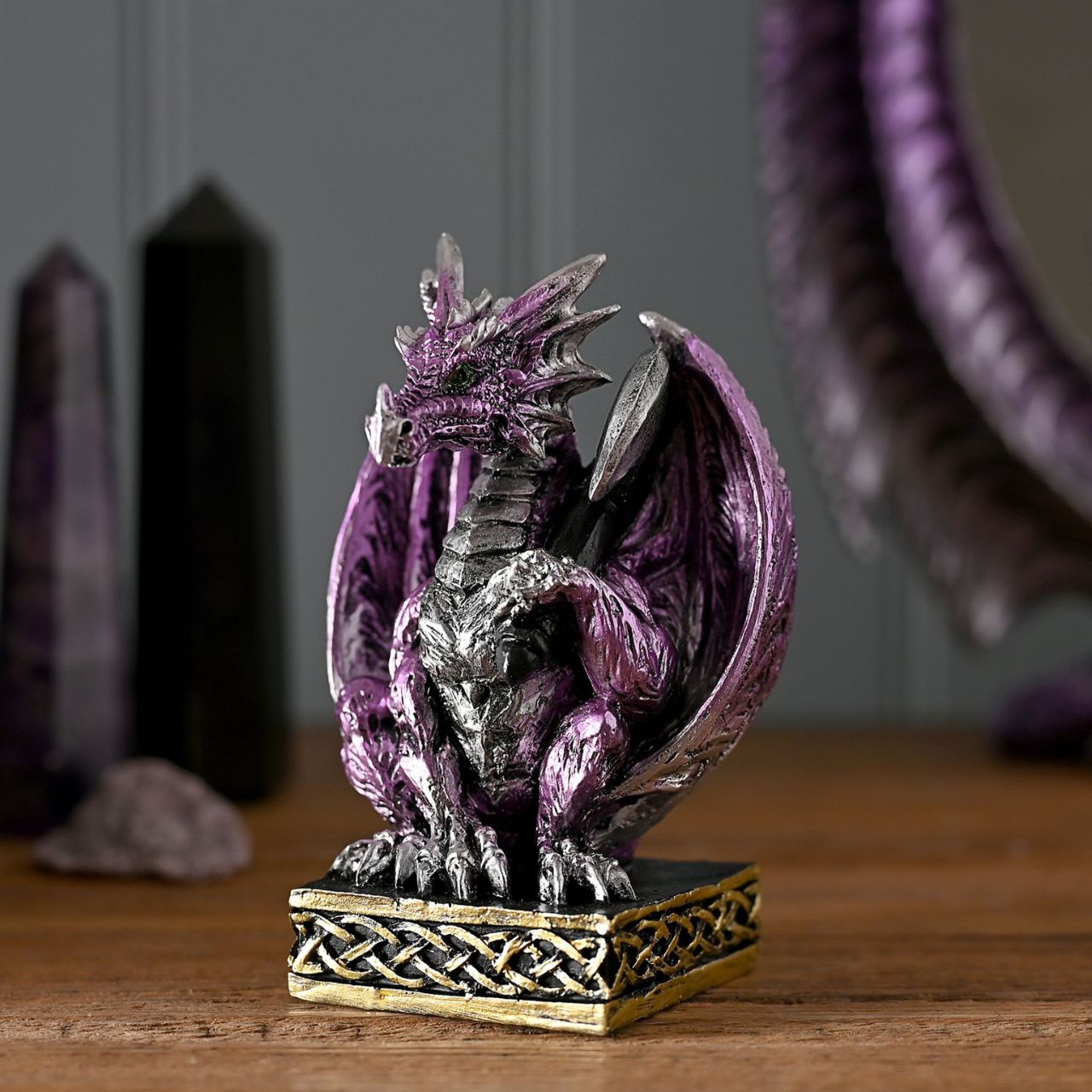 Each one depicts a unique dragon design and colour. They are made from high-quality resin which allows for intricate detailing. A brand for customers and avid collectors who are drawn to the mystical and gothic aesthetic.