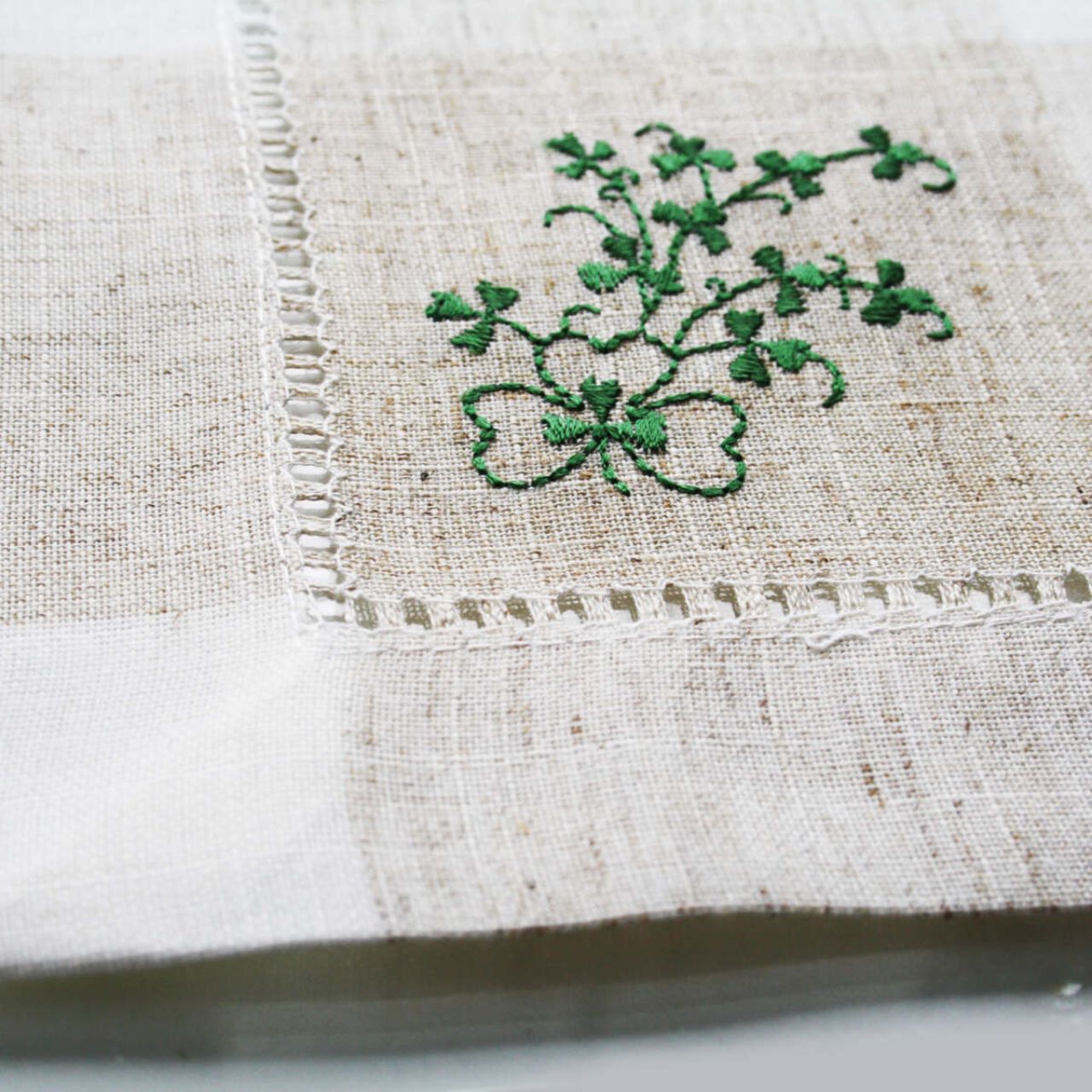 Kinsale Shamrock Table Runner 14" x 72" by Samuel Lamont  Lets bring the luck of the Irish to the table! Our stunning embroidered Kinsale Shamrock range features a variety of elegantly designed table textiles to sure bring a splash of green to your home. 
