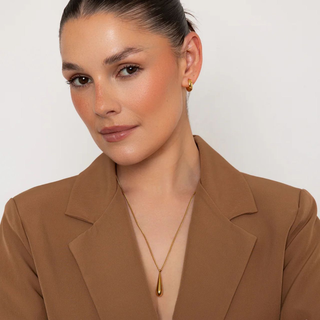 Beautiful gold plated elongated drop.