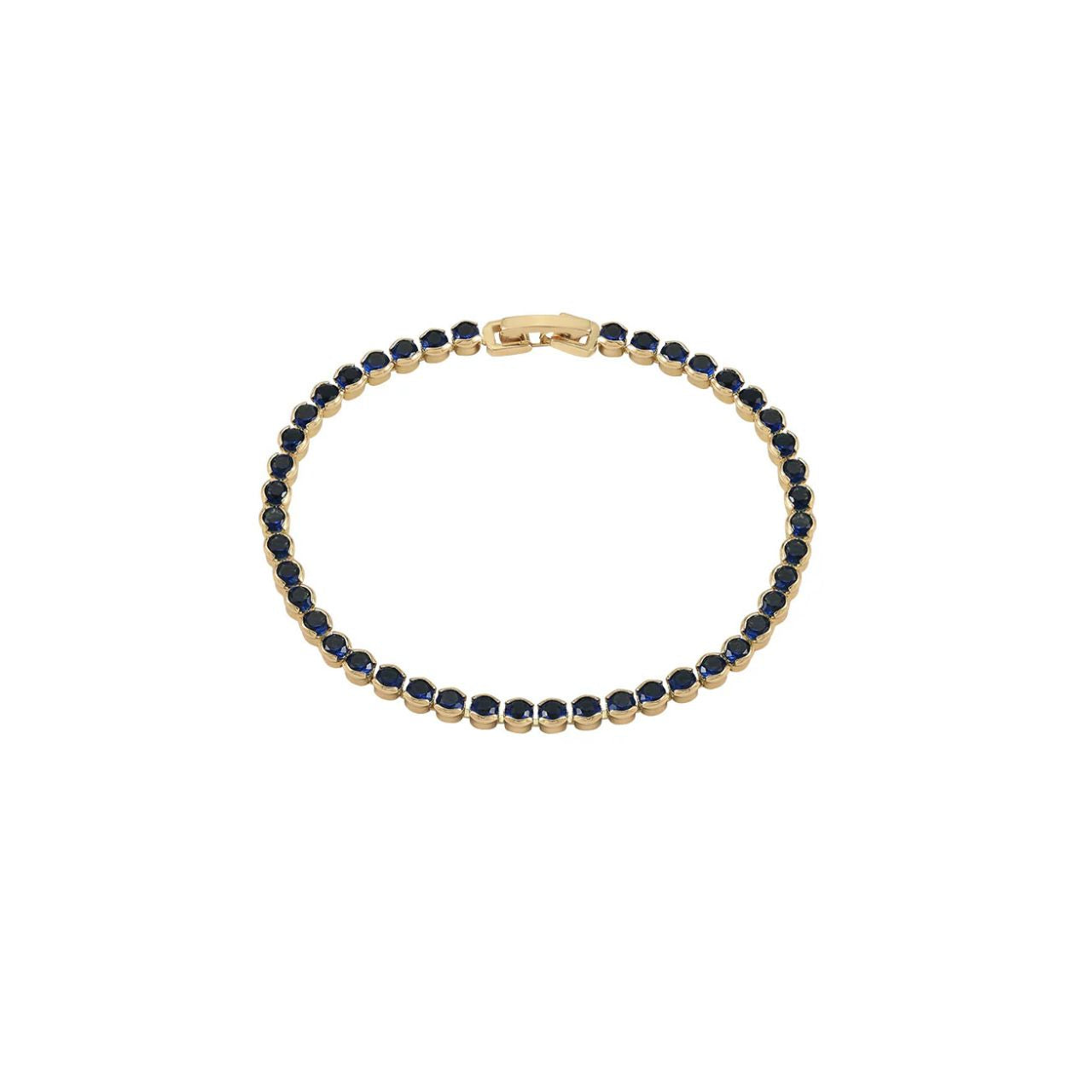Miniature gold plated tennis bracelet with sapphire CZ stones. Elegant when worn alone and also ideal for layering with watch or other bracelets. Fold over clip fastening.