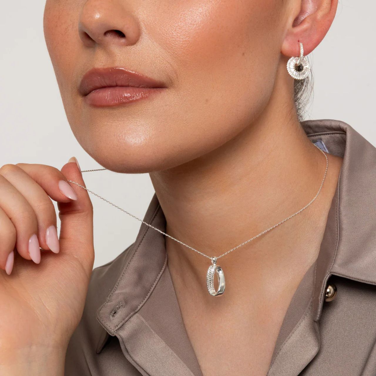 Classic style miniature hoops with removeable disc drop richly encrusted with CZ stones.