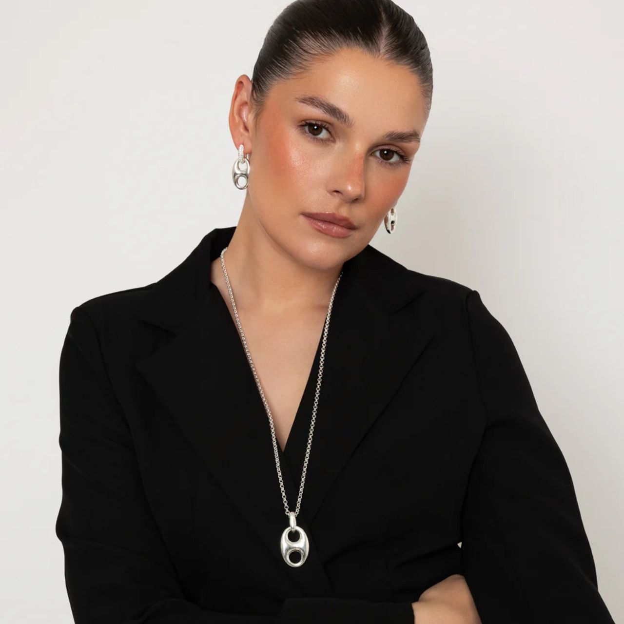 Long rolo chain with chunky contemporary design drop.