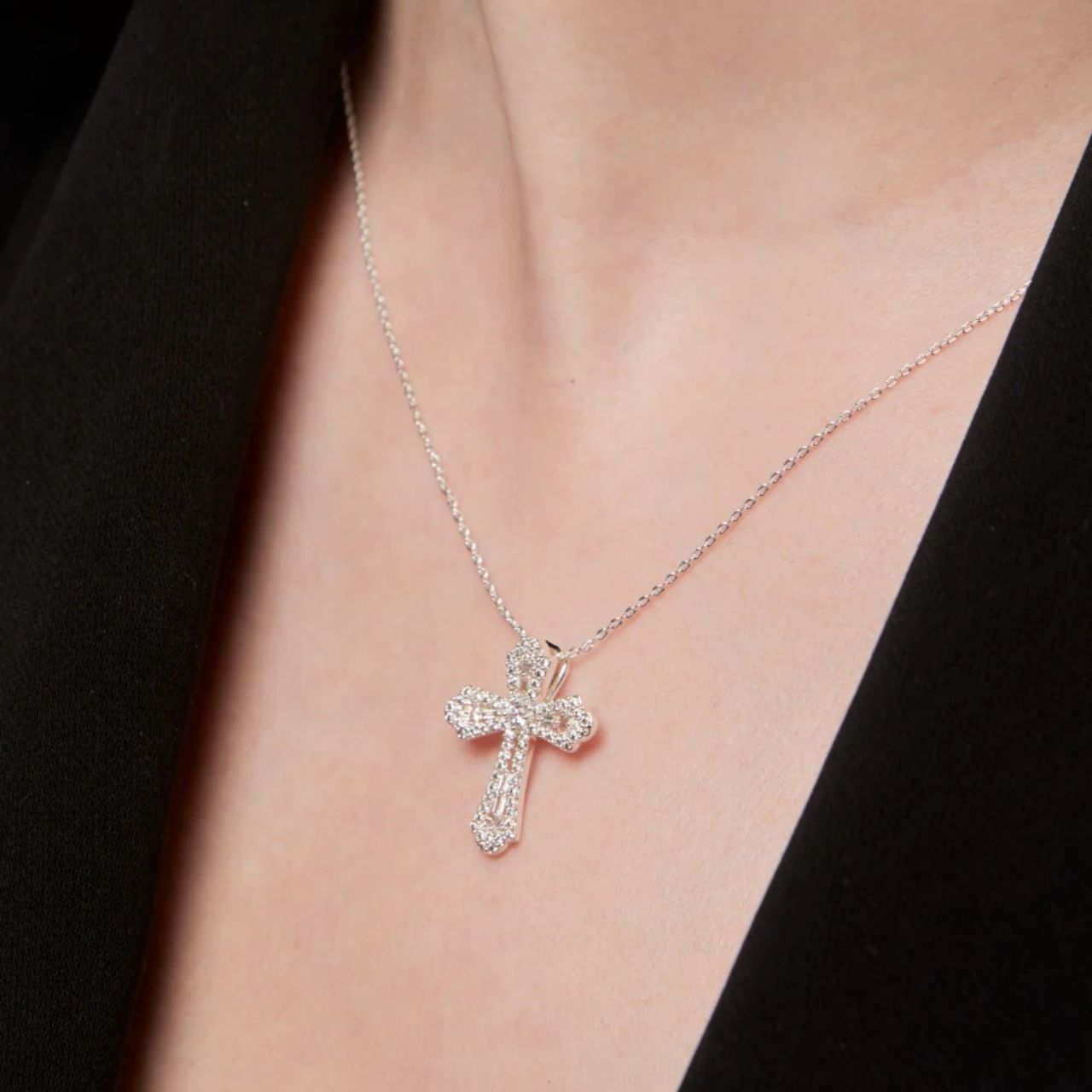 Silver cross necklace beautifully embellished with CZ stones.