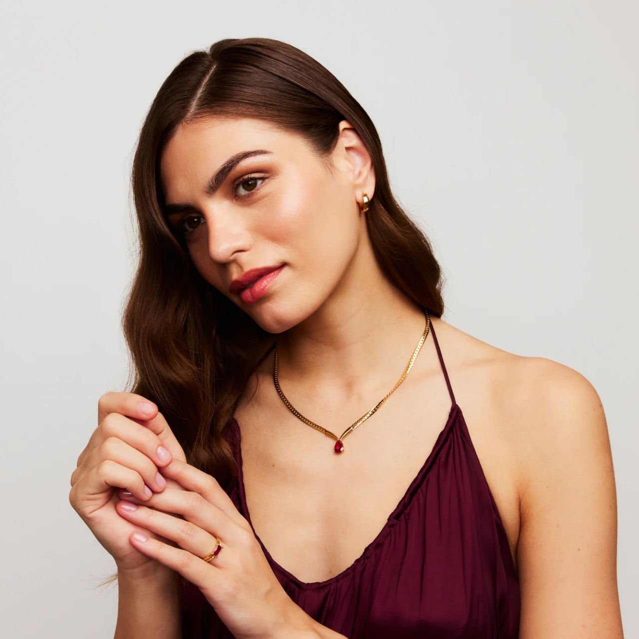 Elegant necklace with ruby crystal teardrop centre piece.